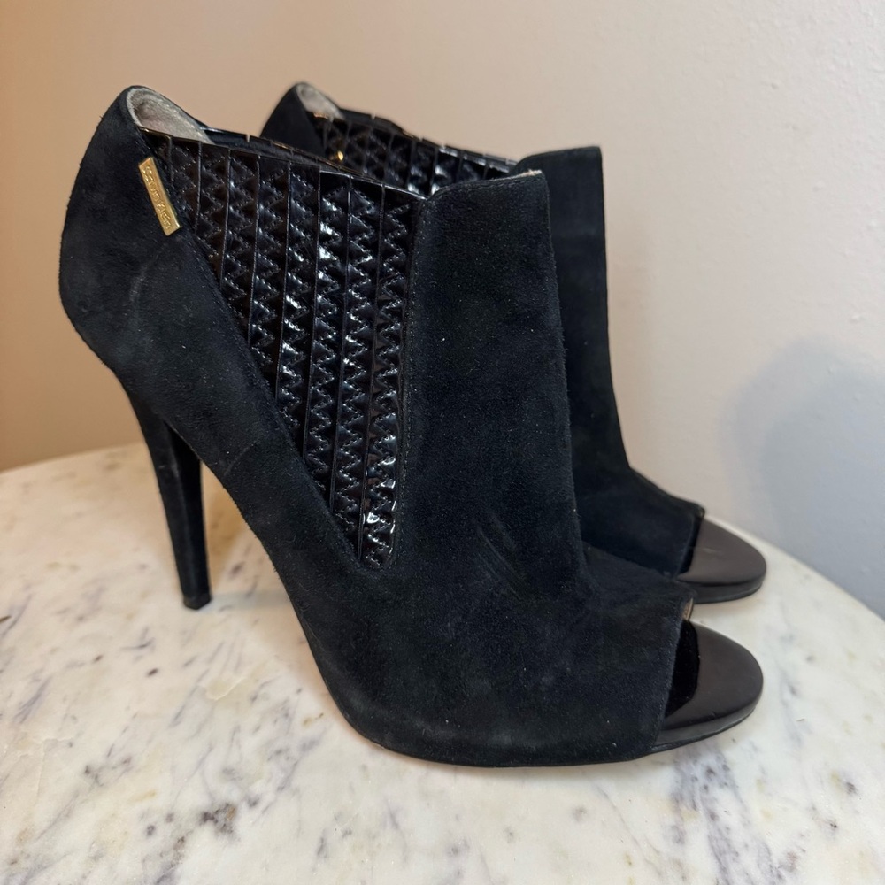 Calvin Klein Booties Size 8 black Suede
Shoes heels Peep Toe